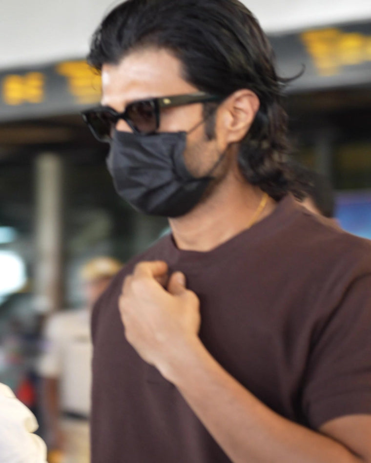 Vijay Deverakonda at the airport in the RWDY Grain Henley Tee, Coffee Black